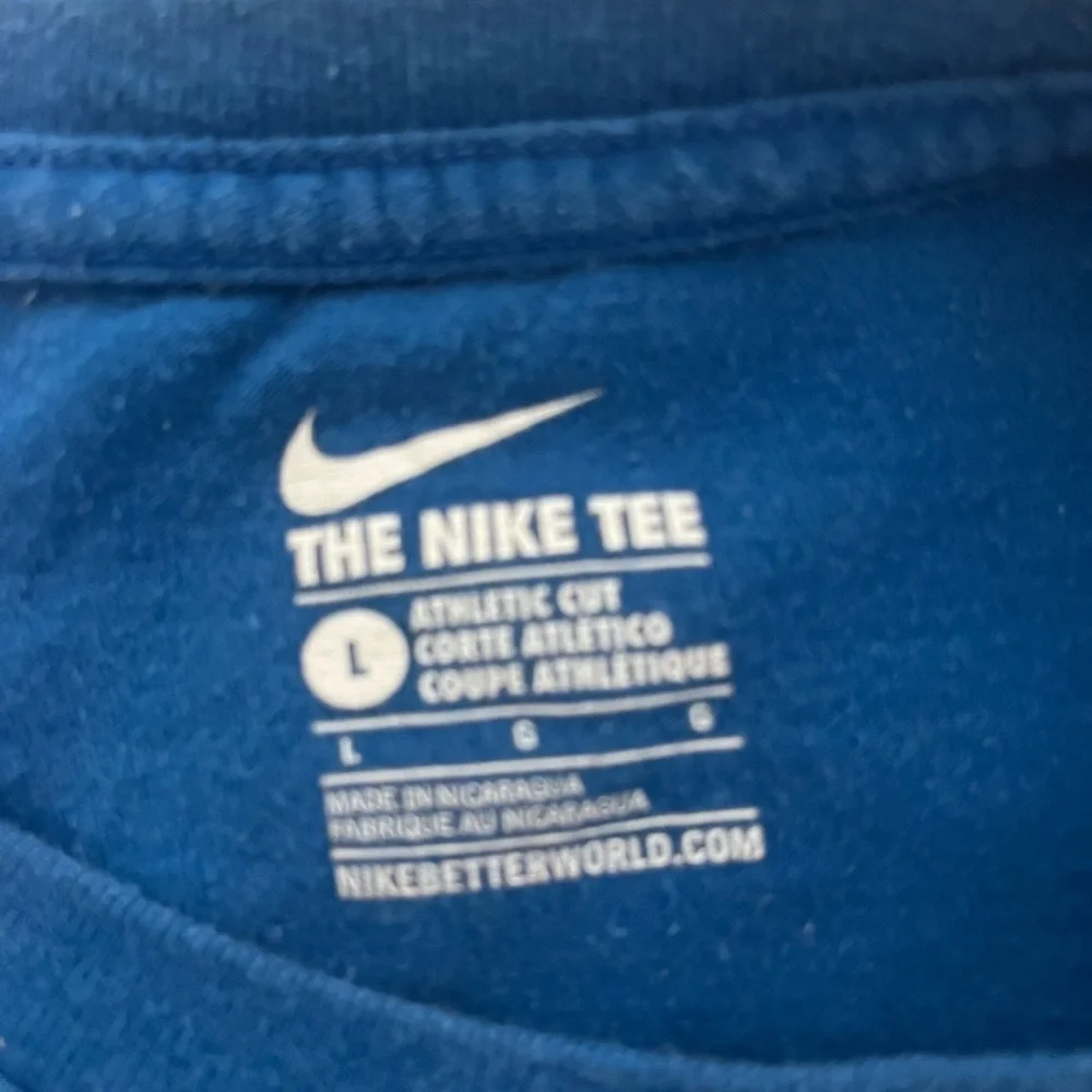 Nike Women’s Blue “Hoops”Graphic Baby T Shirt. Size: Large. Good Condition.